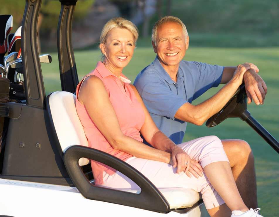 people in golf cart